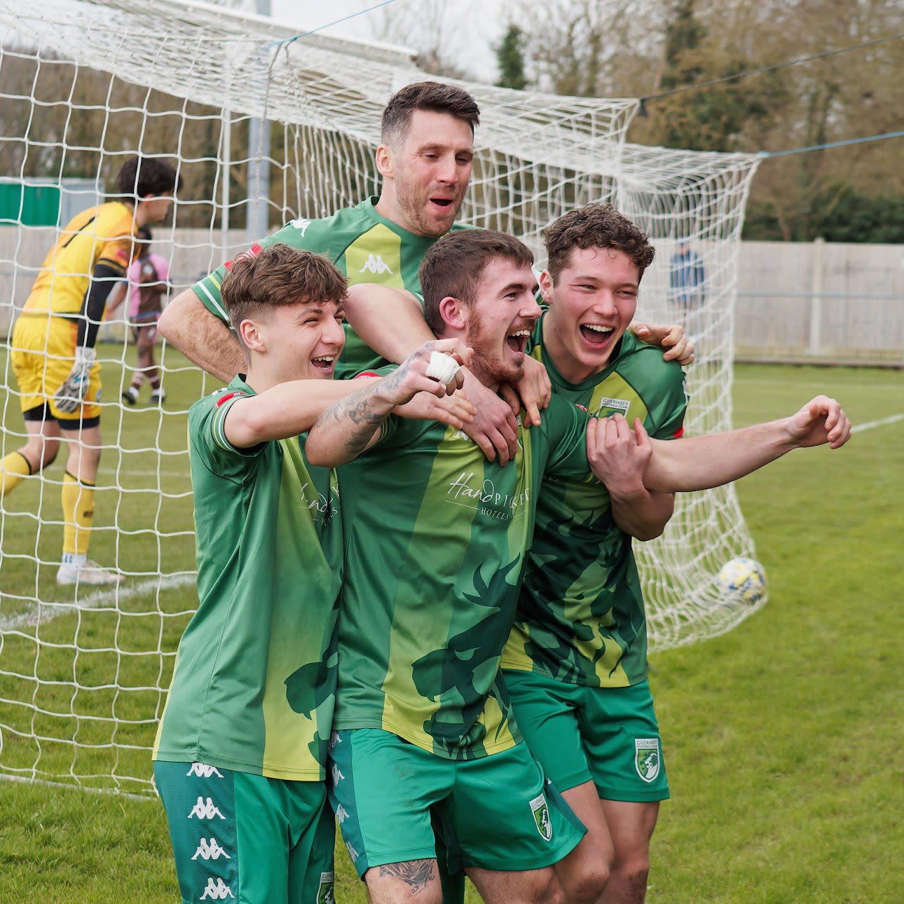 Guernsey FC celebrate scoring their 1000th goal.