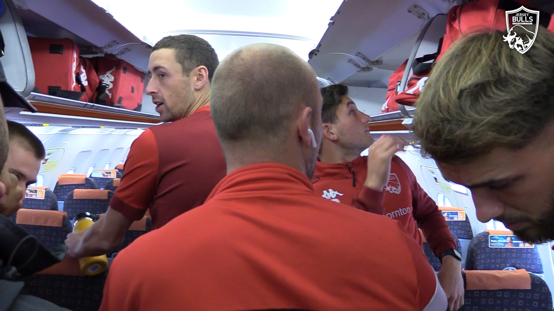 The Jersey Bulls players on board a flight.