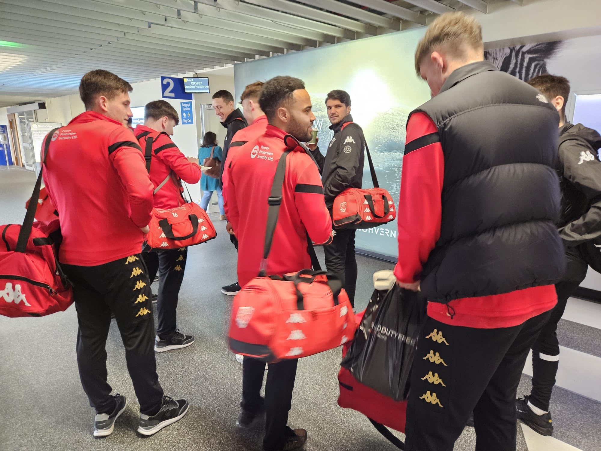 Jersey Bulls players prepare to board their outbound flight.